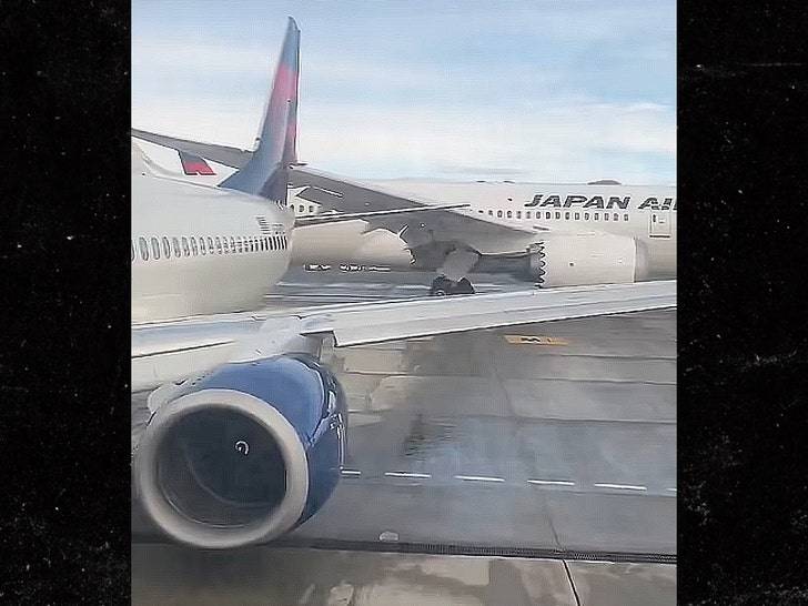 Два самолета устроили «горячий поцелуй» в аэропорту Сиэтла! 💋✈️ (Фото: 1)