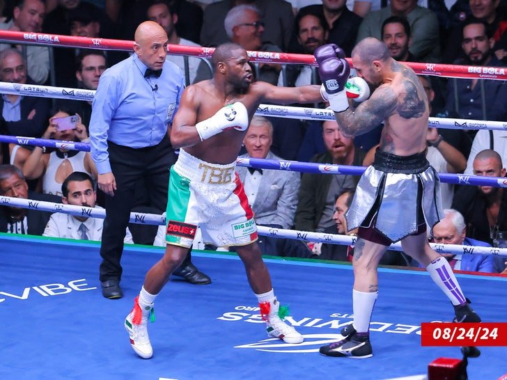 Фото: 🥊🔥 Скандал на ринге: Флойд Мейвезер уволил судью прямо во время боя! - Фото 2